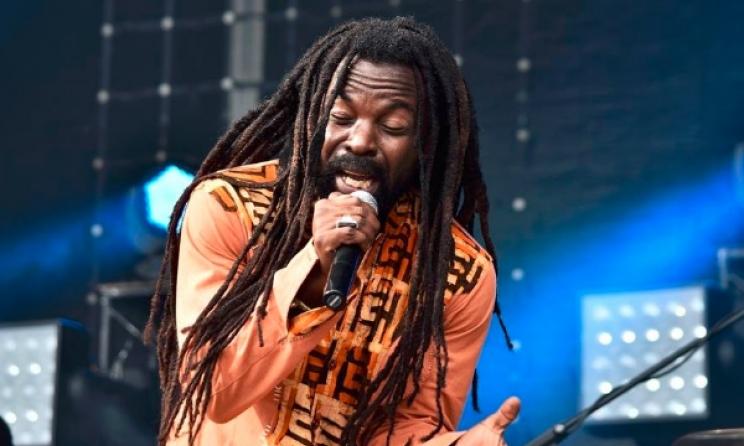 Rocky Dawuni performing on stage