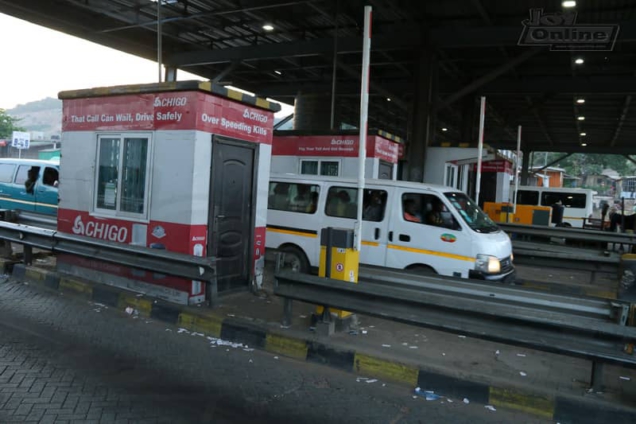 cars at a road tolls collection point