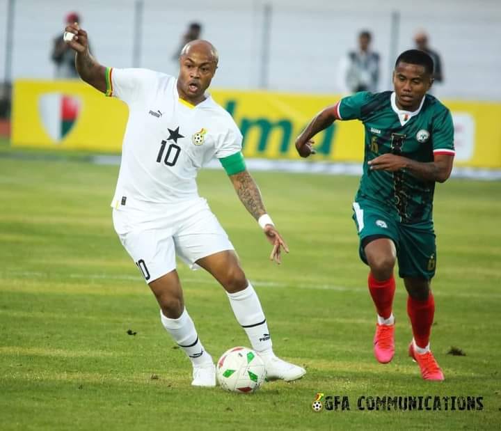 Black Stars skipper Andre Ayew being challenged for the ball by Ando Manoelantsoa of Madagascar at the Mahamasina Municipal Stadium on June 18, 2023 during a 2023 AFCON qualifying match.