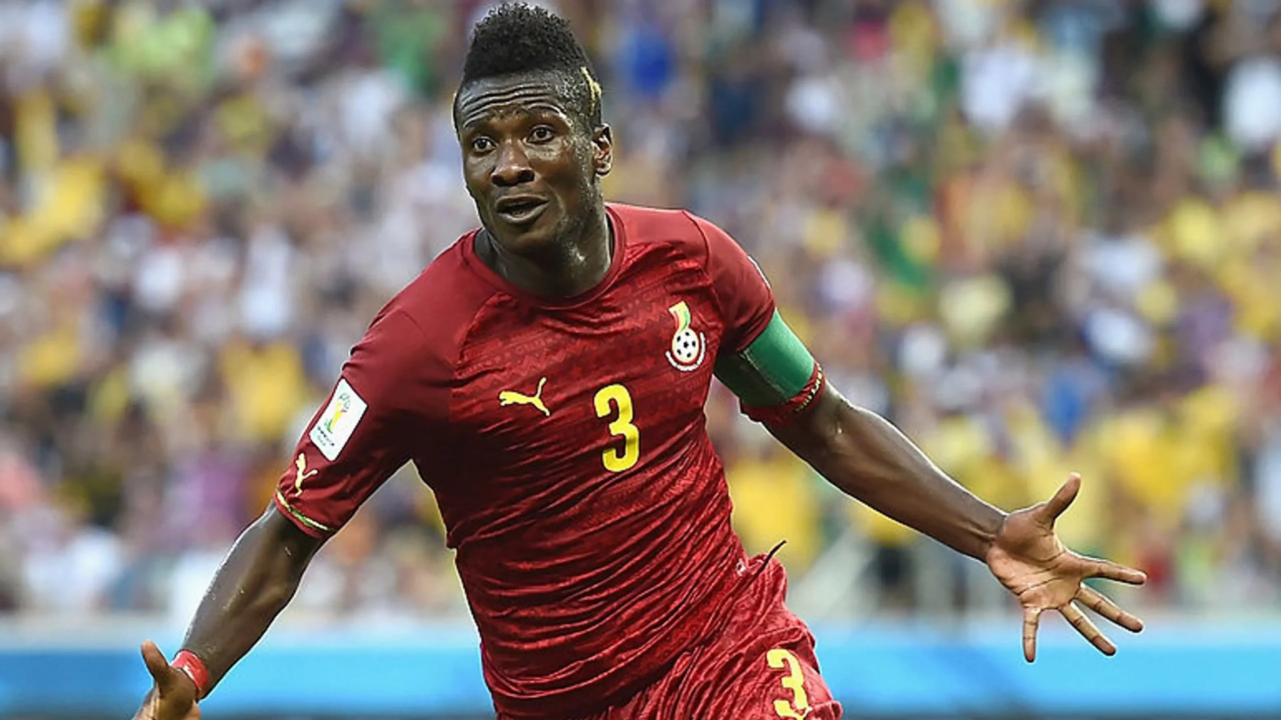 Asamoah Gyan celebrates after scoring for Ghana