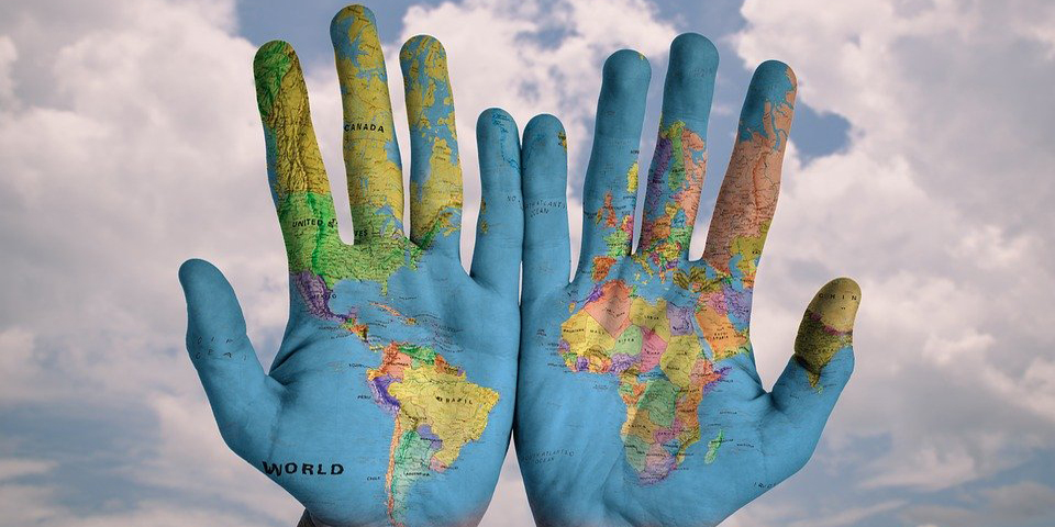 Hands designed with world map