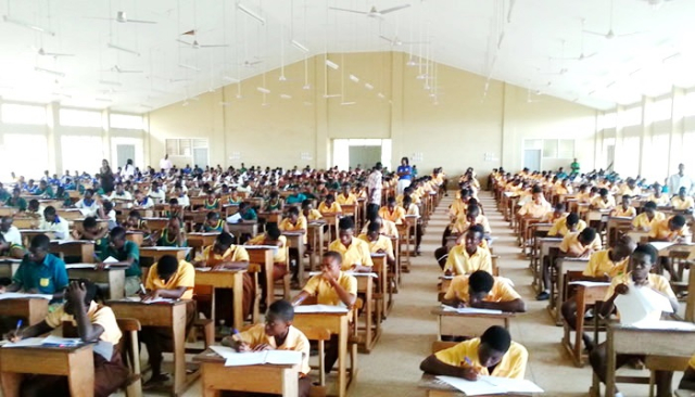 BECE candidates seated in an examination hall
