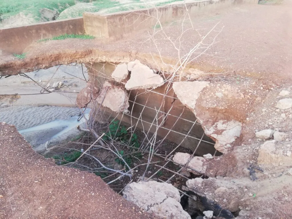 the broken Sirigu-Zorkor road bridge