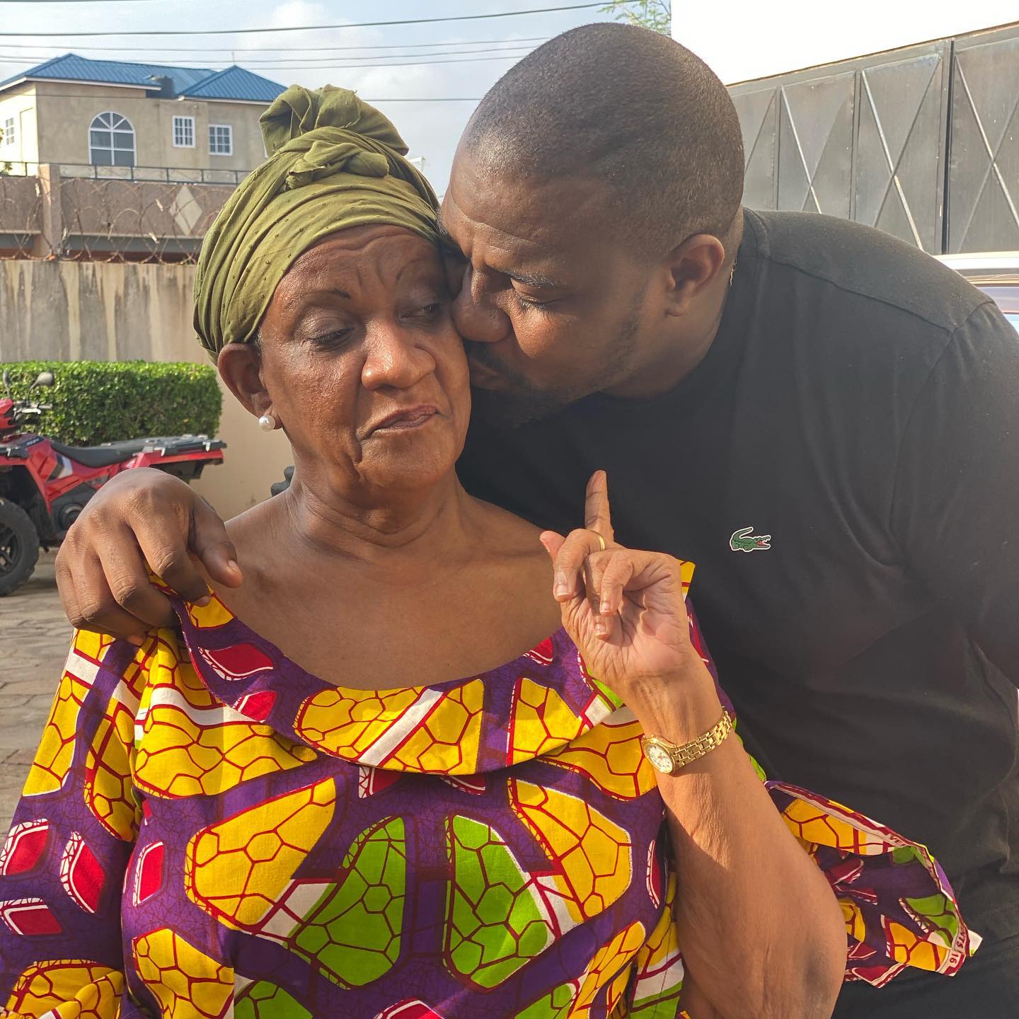John Dumelo with his mother Mrs. Antoinette Ama Ampomah Dumelo