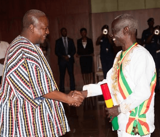 John Mahama shakes the hands of former EC boss, Kwadwo Afari Gyan