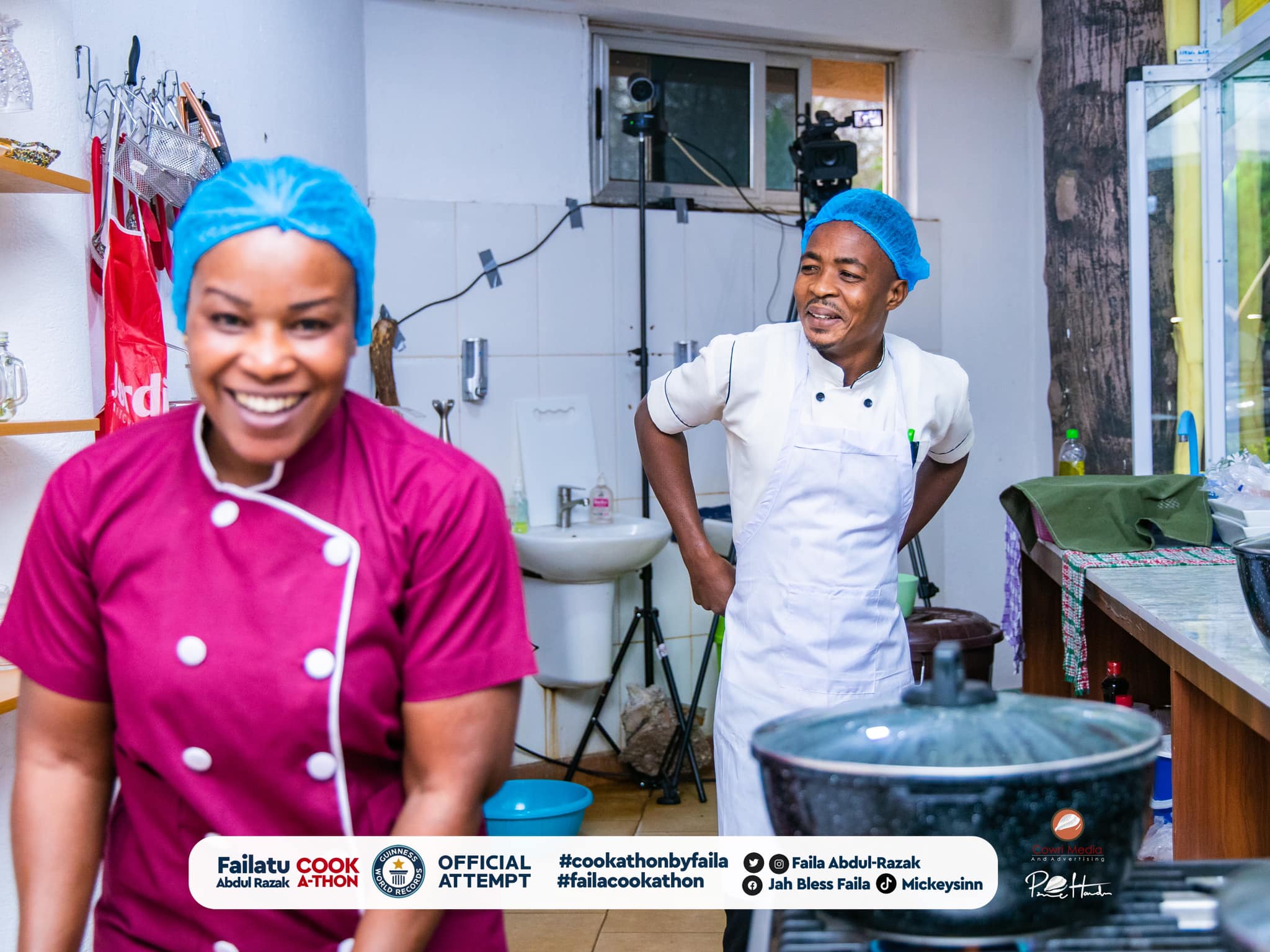 Faila and her sous-chef are all smiles in the kitchen