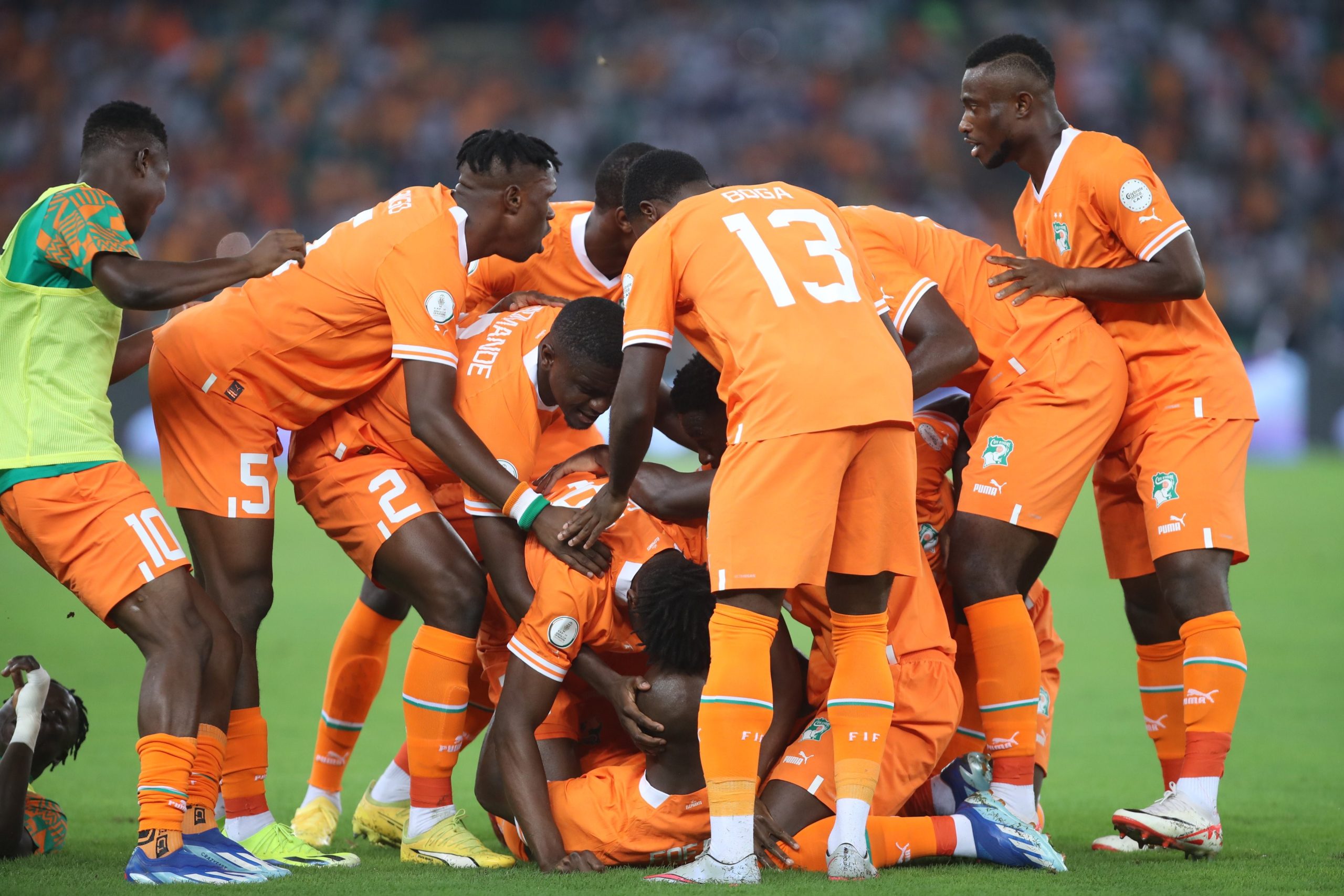 Ivory Coast players celebrate the opening goal by Seko Fofana against Guinea-Bissau in an AFCON 2023 Group A match at the Olympic Stadium of Ebimpé.