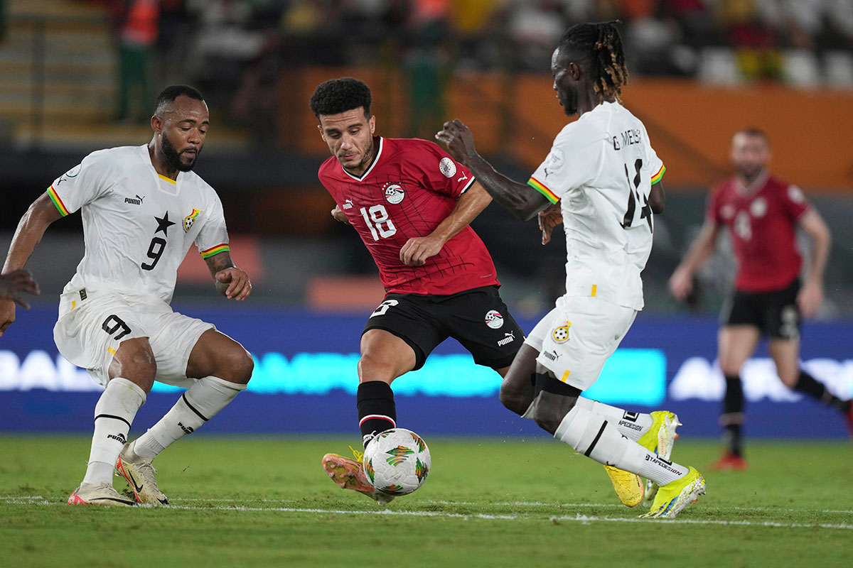 Jordan Ayew (left) and Gideon Mensah (right) track Mostafa Mohammed during Ghana vs Egypt. Both Ayew and Mensah are expected to start in Ghana vs Mozambique