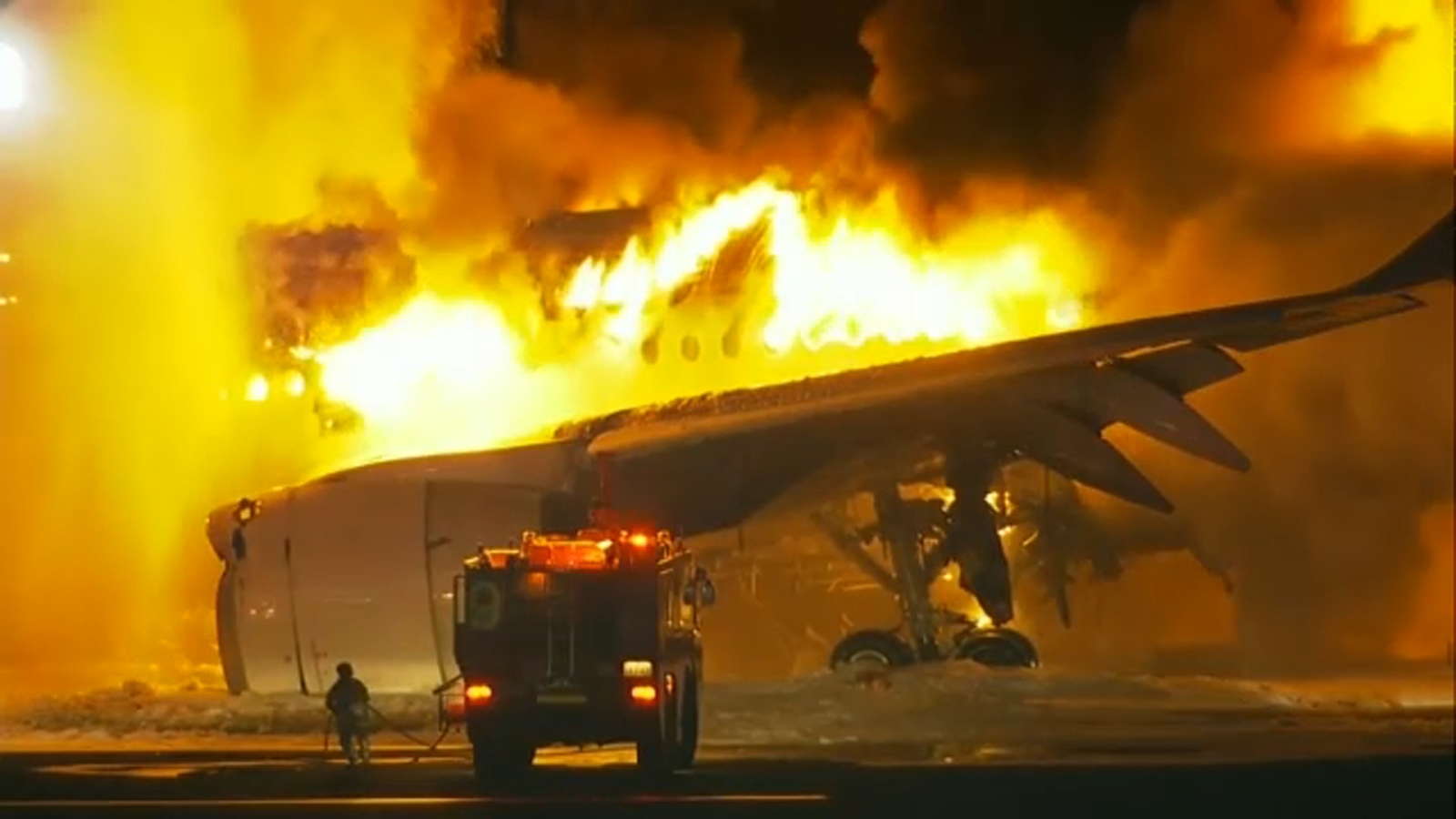 Japan Airlines on fire at the Haneda Airport in Tokyo