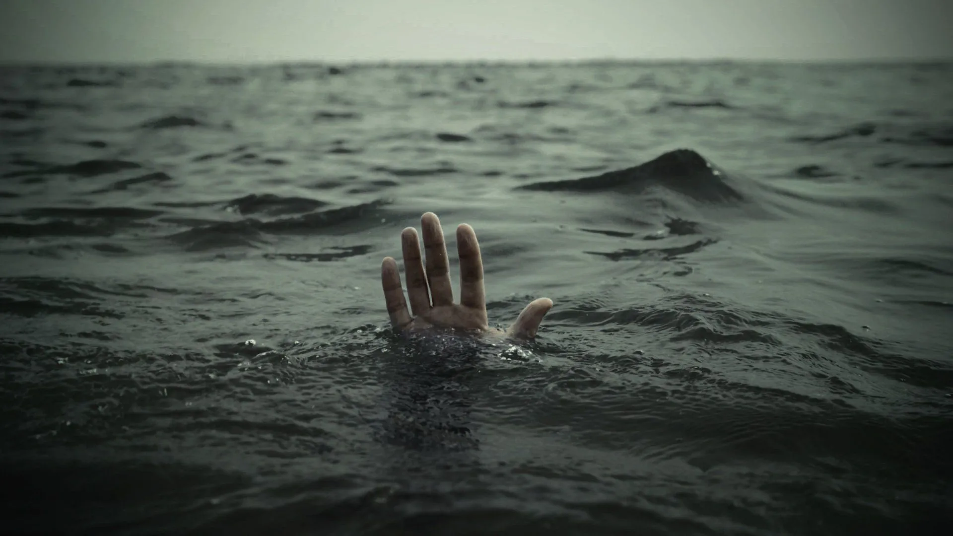 a person drowning in water