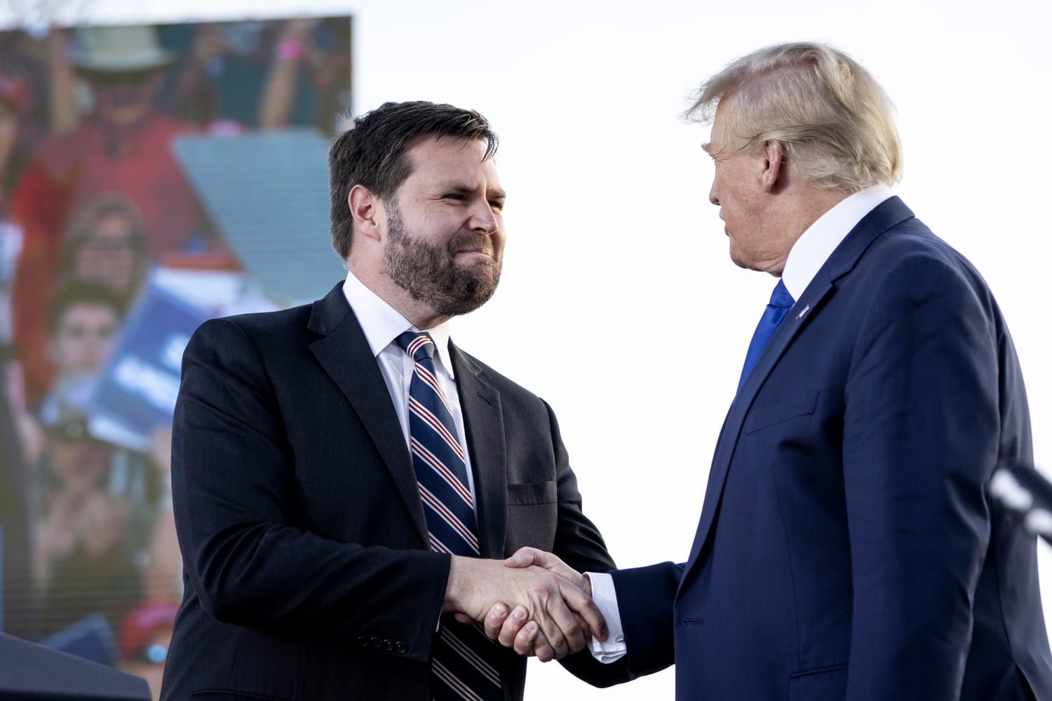 J.D Vance greets Donald Trump